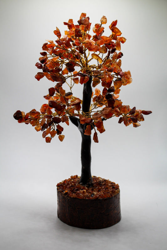 Carnelian crystal tree with carnelian pieces as leaves.