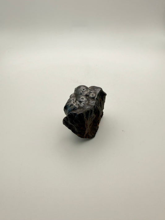 Small raw hematite specimen.