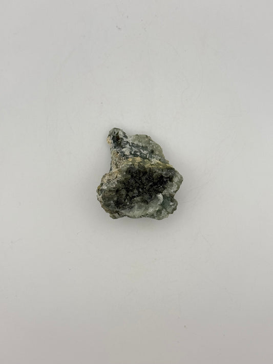 Raw prehnite specimen with amazing green color.