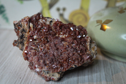Vanadinite specimen with amazing sparkly red crystal formations.