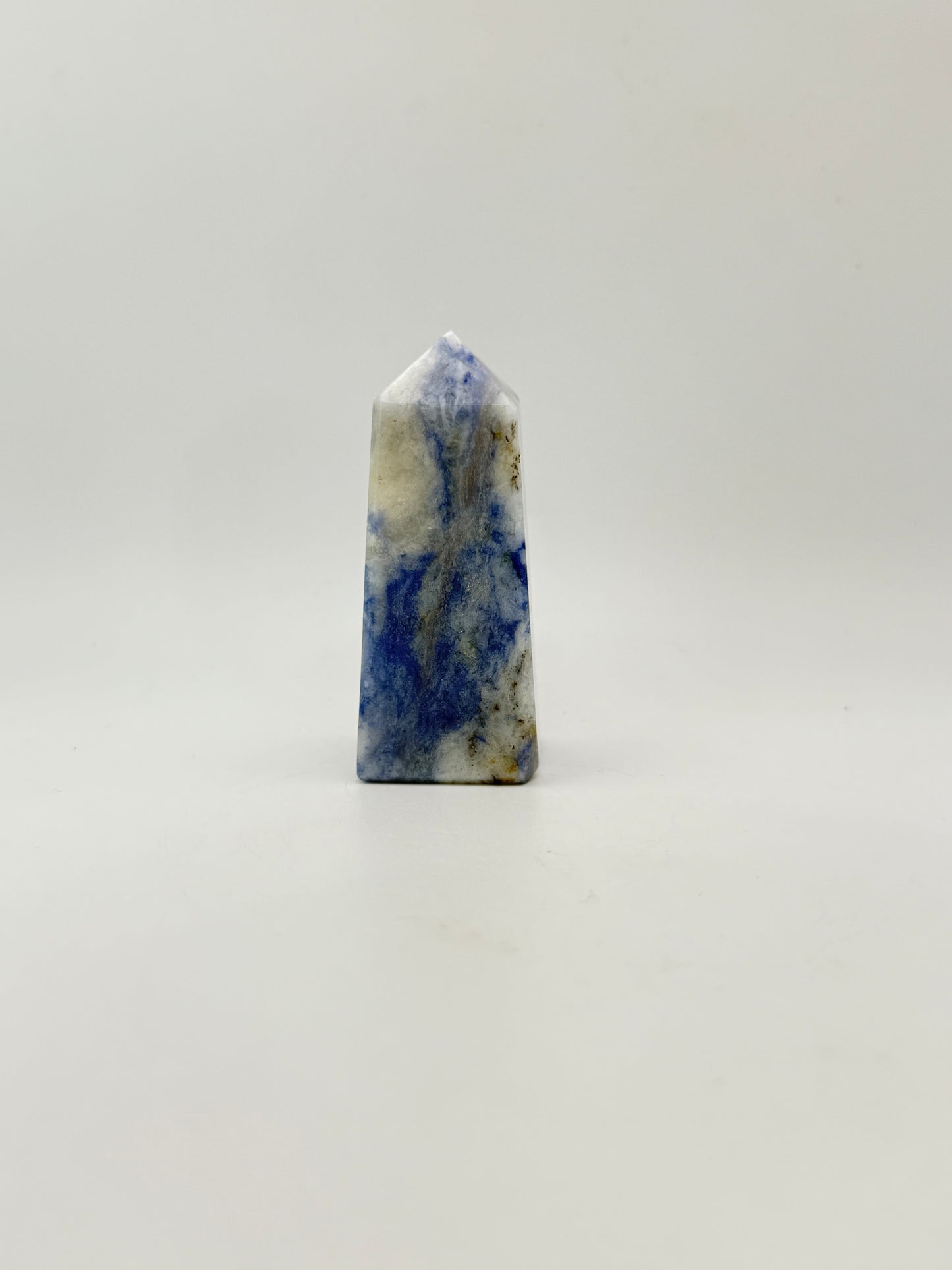 Afghanite four sided tower. Height of 3 inches, width of 1 1/8 inches.