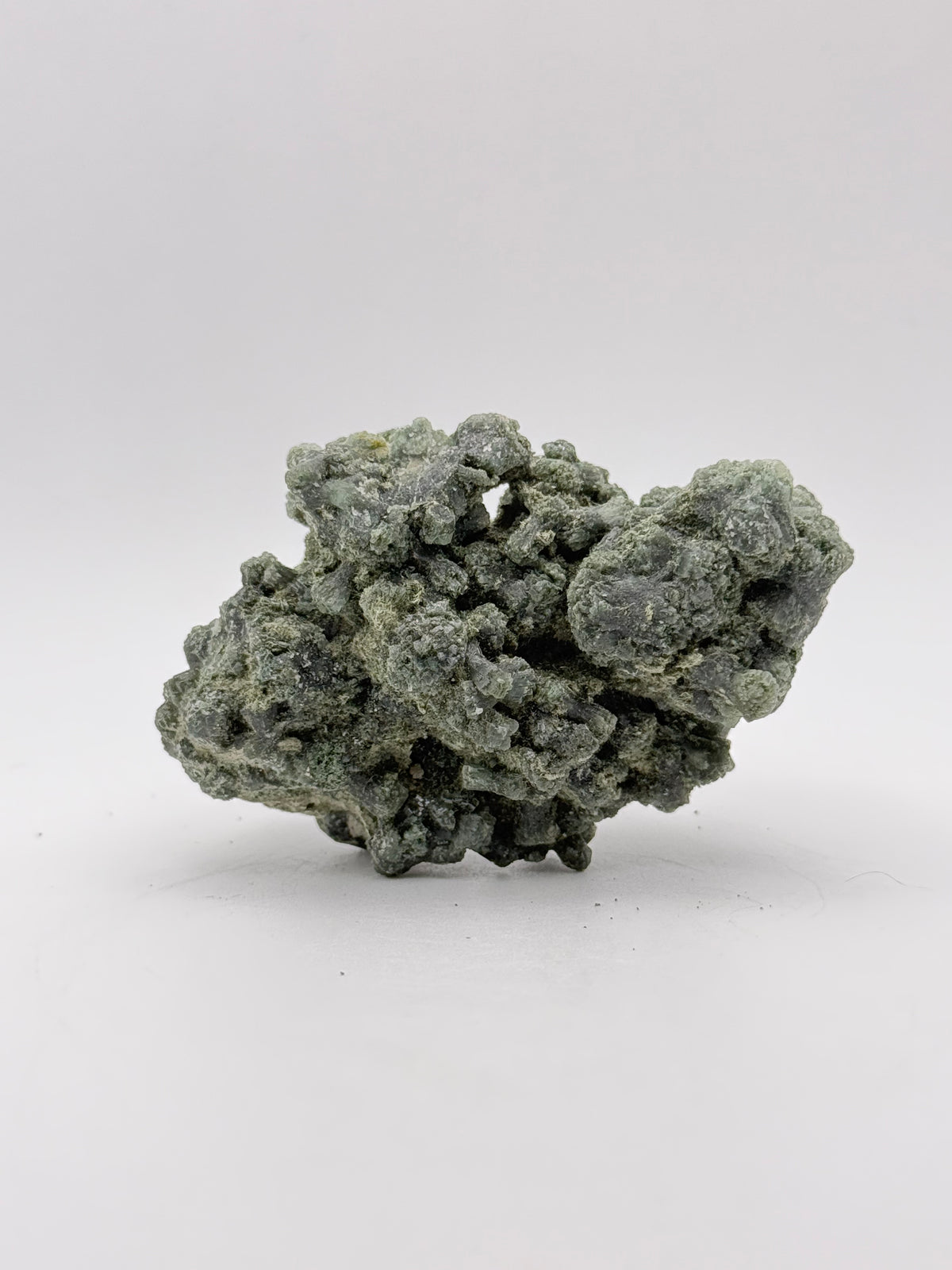 Raw prehnite specimen with amazing green color.