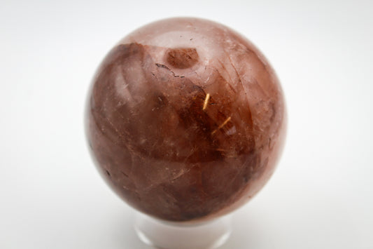 Polished red hematoid sphere.