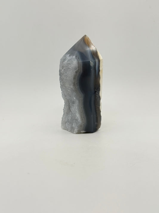 Polished druzy agate tower. About 3 inches tall.