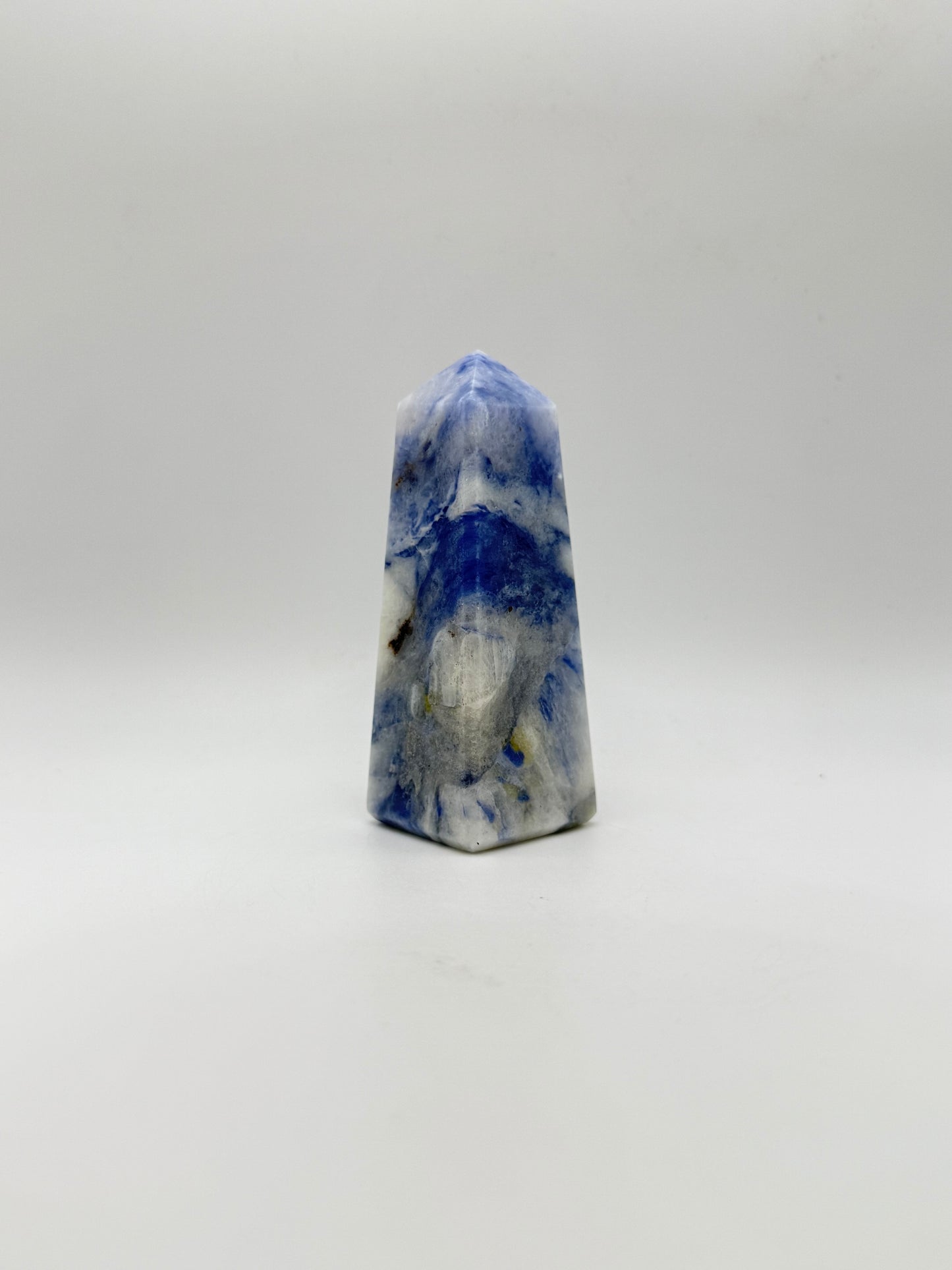 Afghanite four sided tower. Height of 3 1/2 inches, width of 1 1/4 inches.