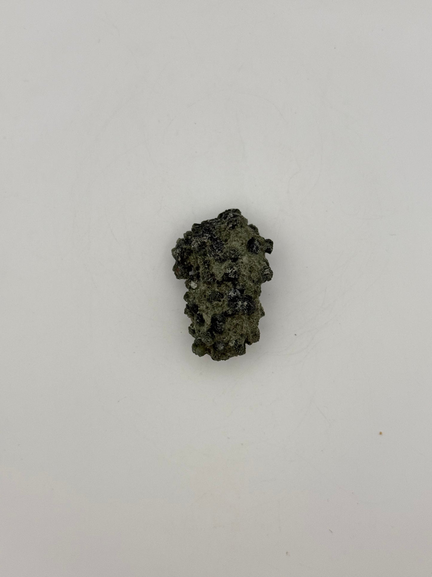 Raw prehnite specimen with amazing green color.