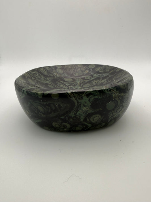 Polished kambaba jasper in the shape of a bowl.