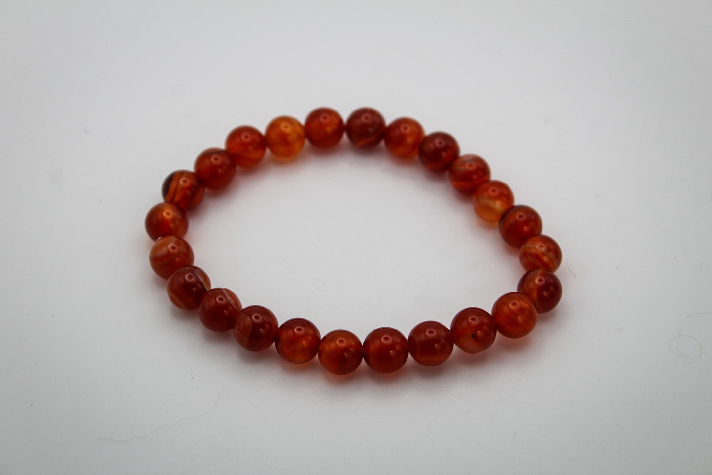 Carnelian crystal bracelet with 8mm beads.