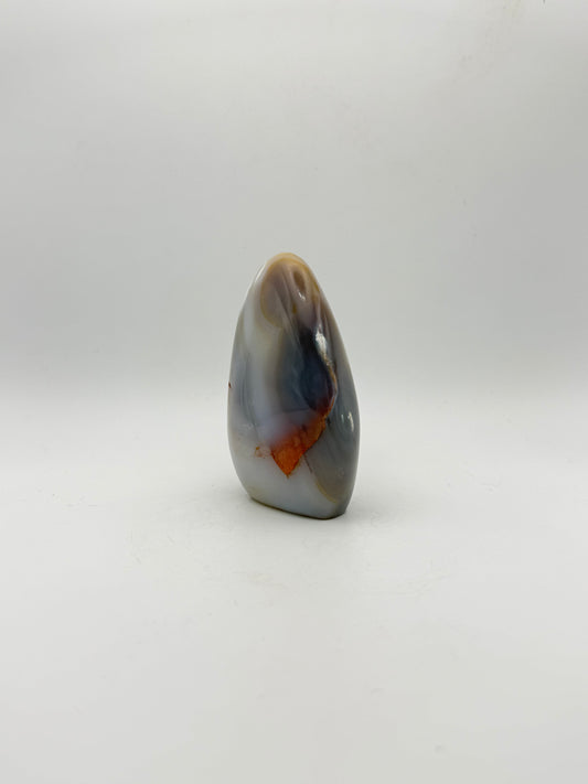 Polished orca agate free form.