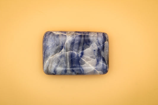 Rectangle soap-shaped afghanite polished crystal.