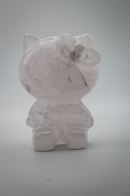 Pink Calcite crystal in the shape of Hello Kitty.