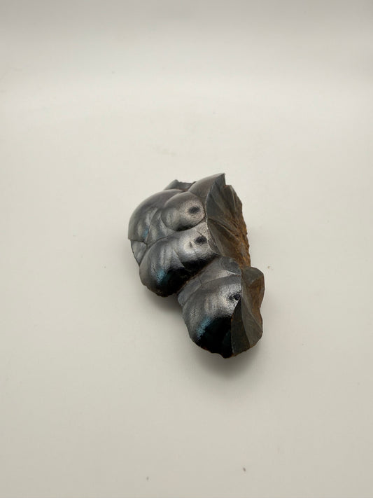 Small raw hematite specimen.