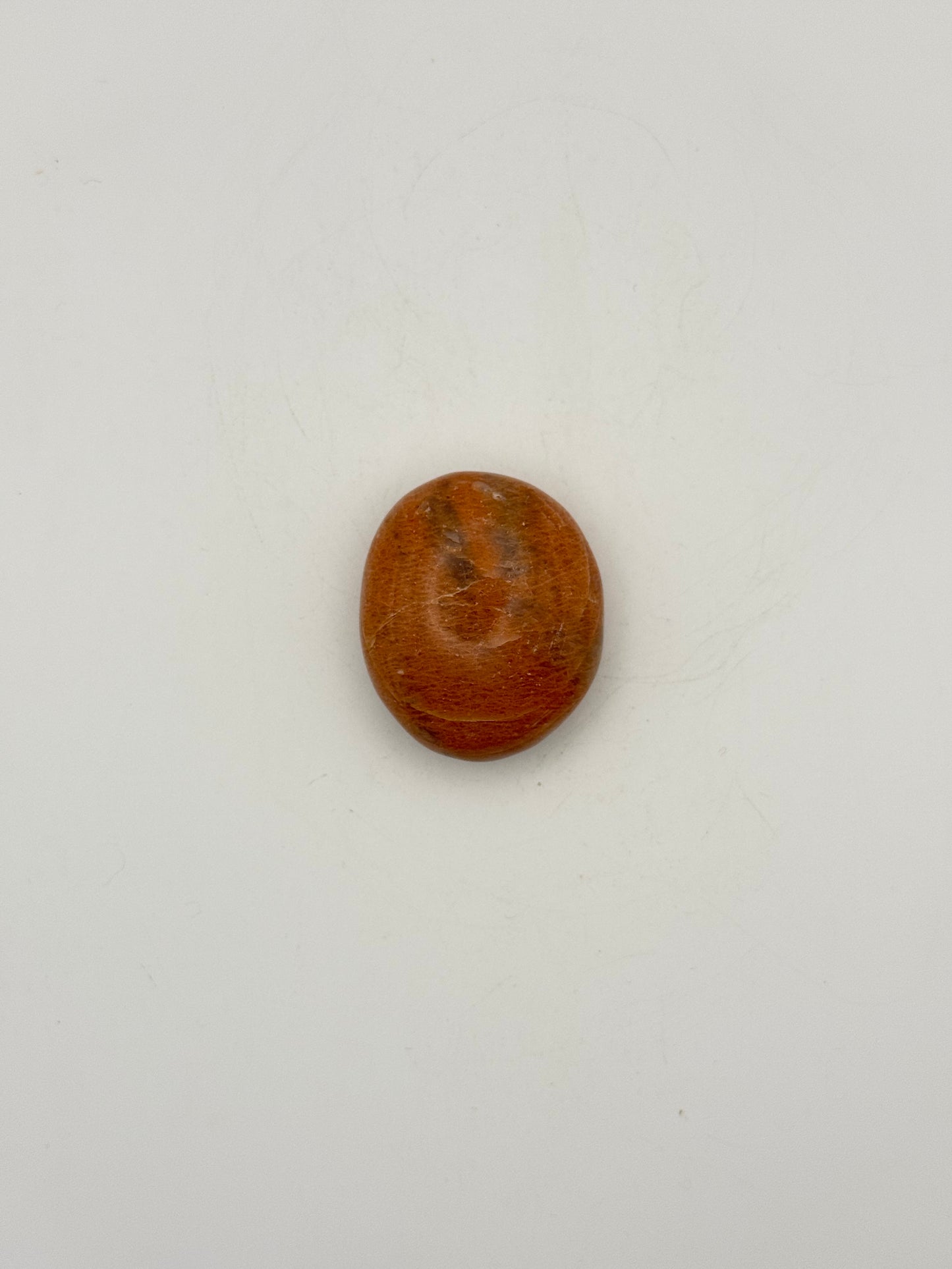 Polished Peach moonstone palm stone.