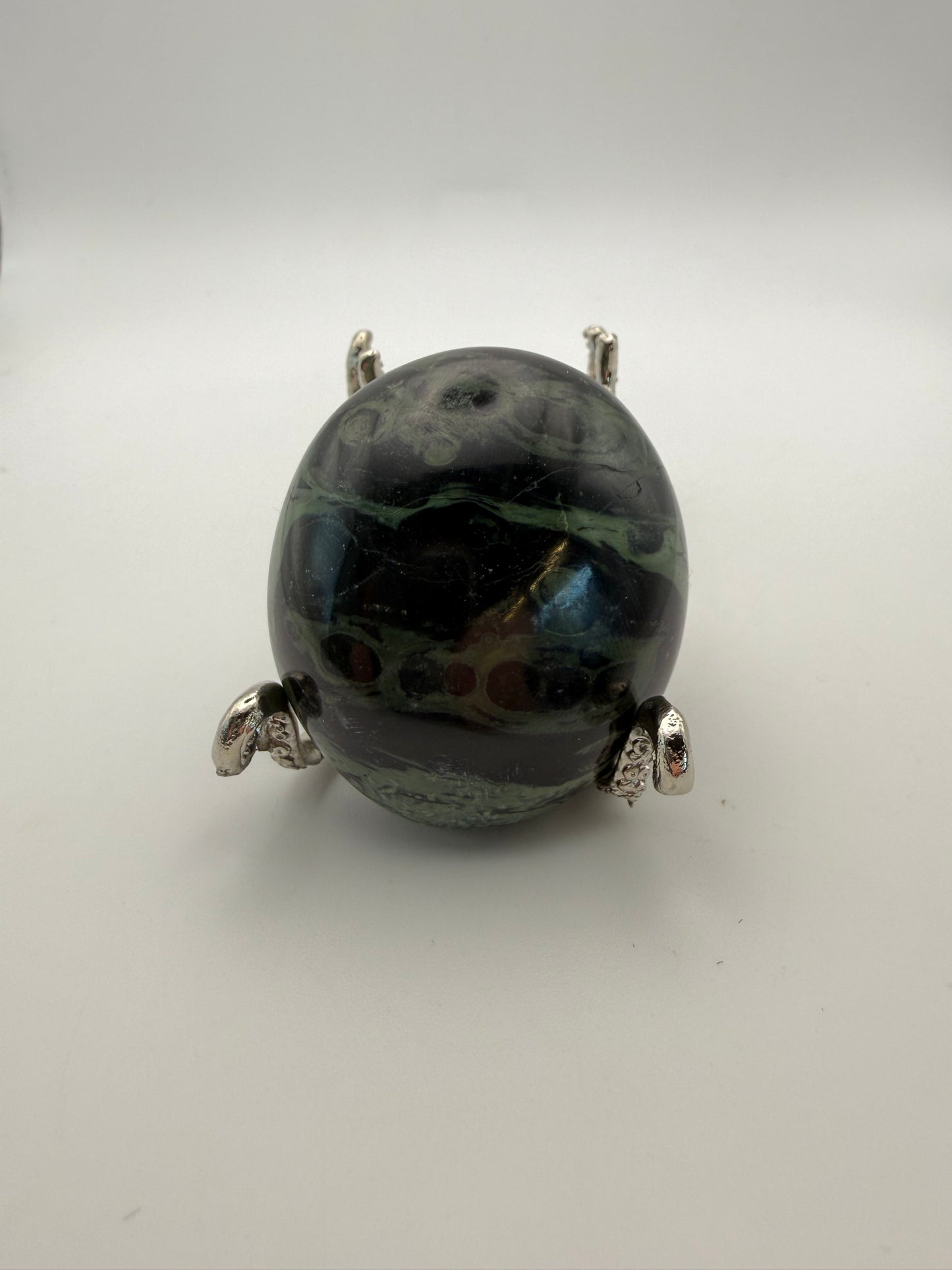 Polished kambaba jasper palm stone.