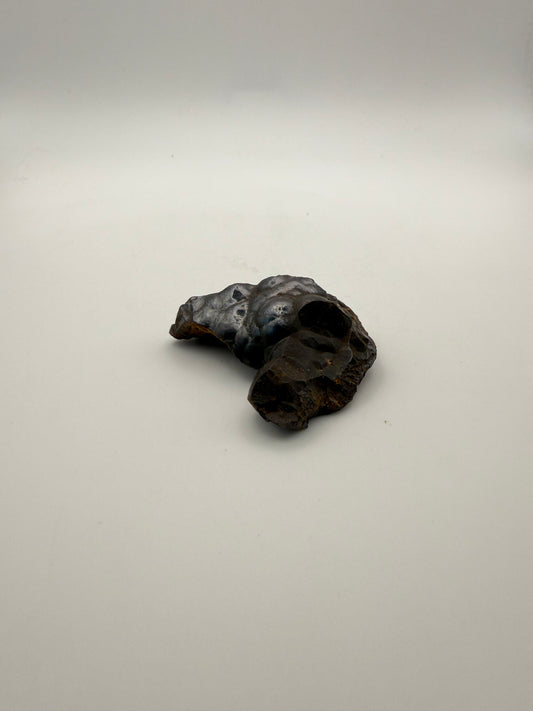 Small raw hematite specimen.