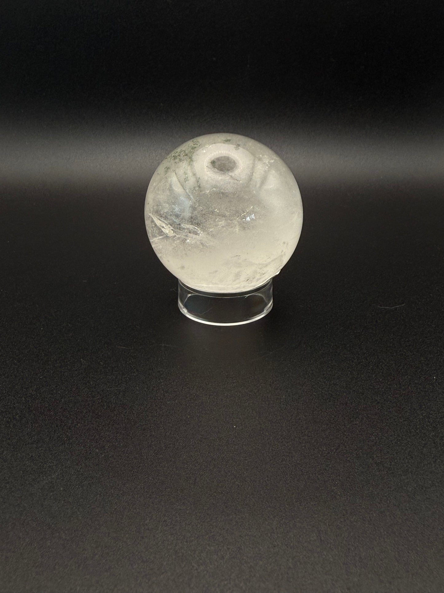 Clear quartz polished crystal sphere.