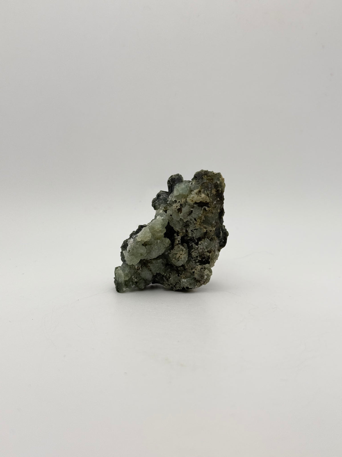 Raw prehnite specimen with amazing green color.