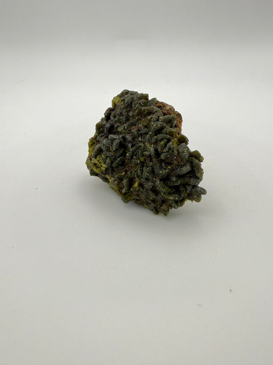 Epidote crystal cluster with good green color.