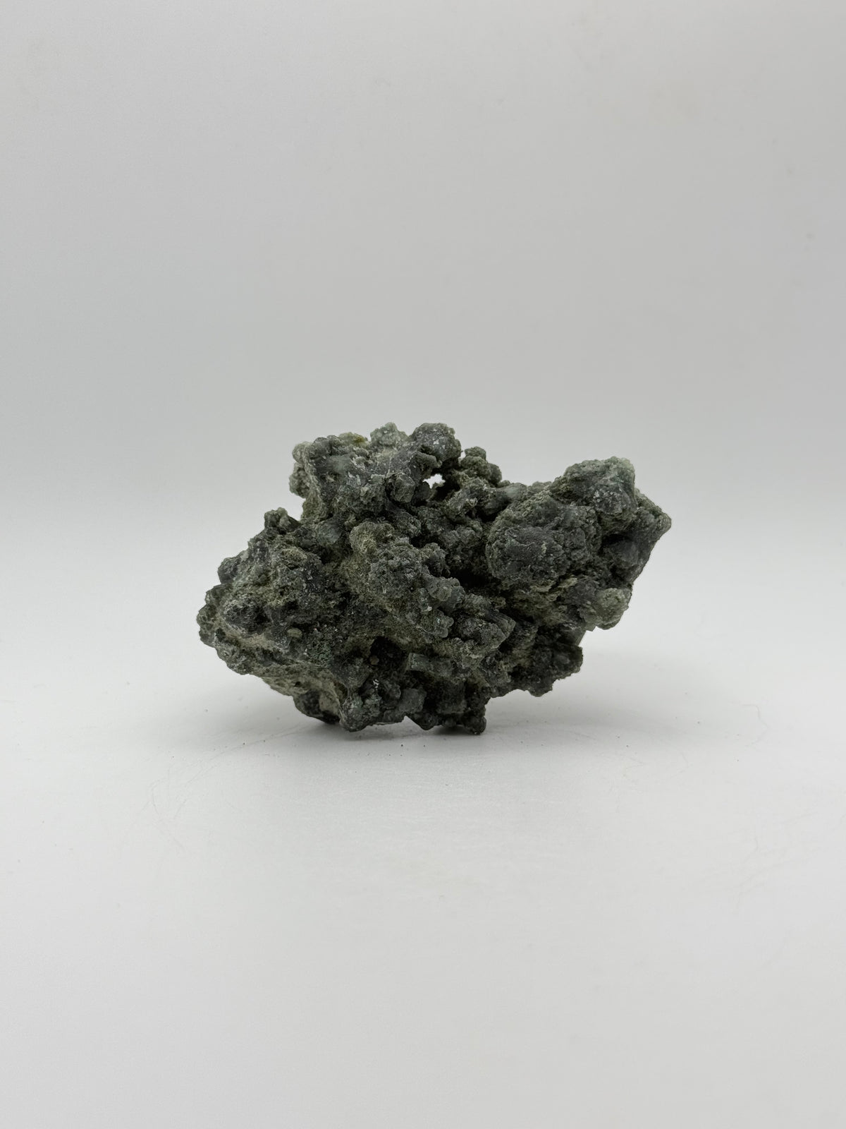Raw prehnite specimen with amazing green color.