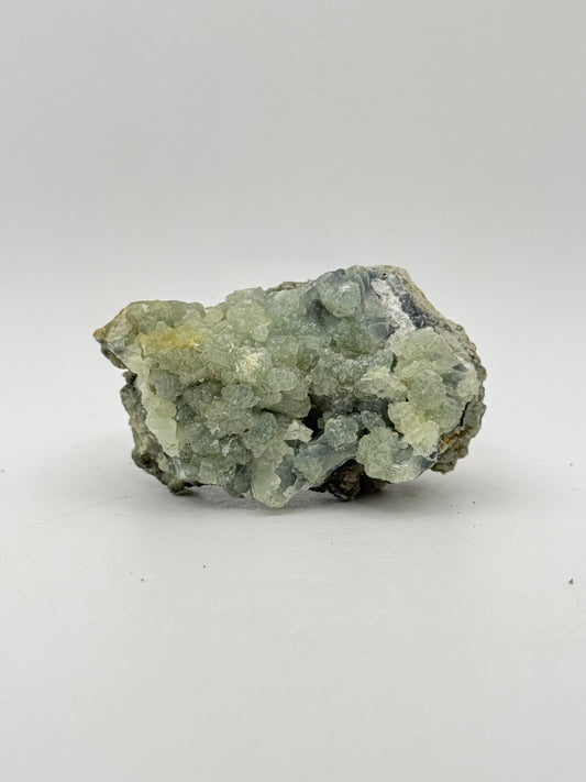 Raw prehnite specimen with amazing green color.