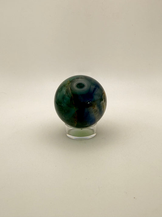 Rainbow Fluorite polished crystal sphere.