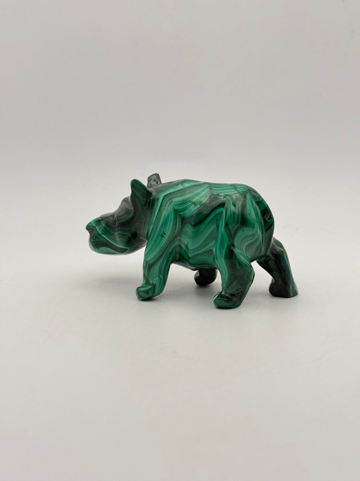 Malachite rhino carving.