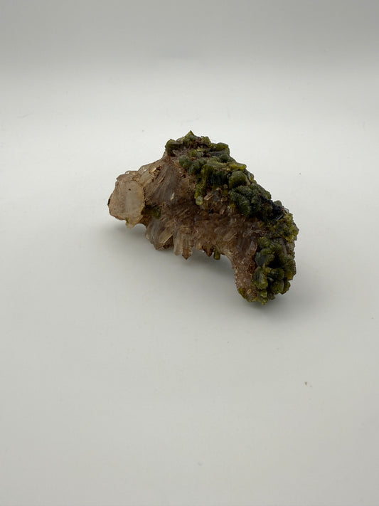 Epidote crystal cluster with good green color.