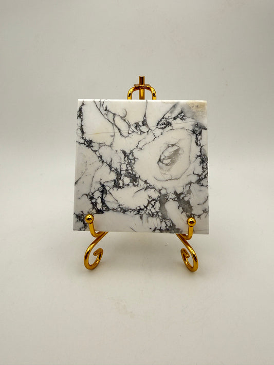 Polished howlite square tile.