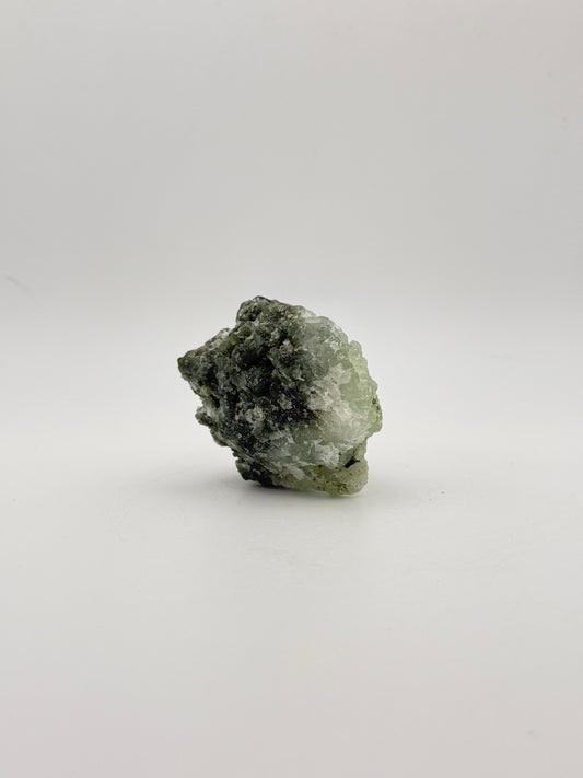 Raw Prehnite specimen with amazing green color.