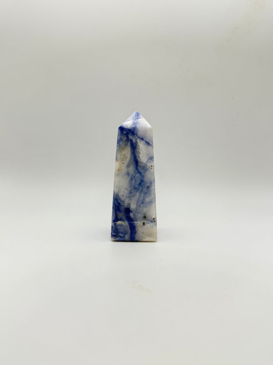 Afghanite four sided tower. Height of 3 1/2 inches, width of 1 1/4 inches.