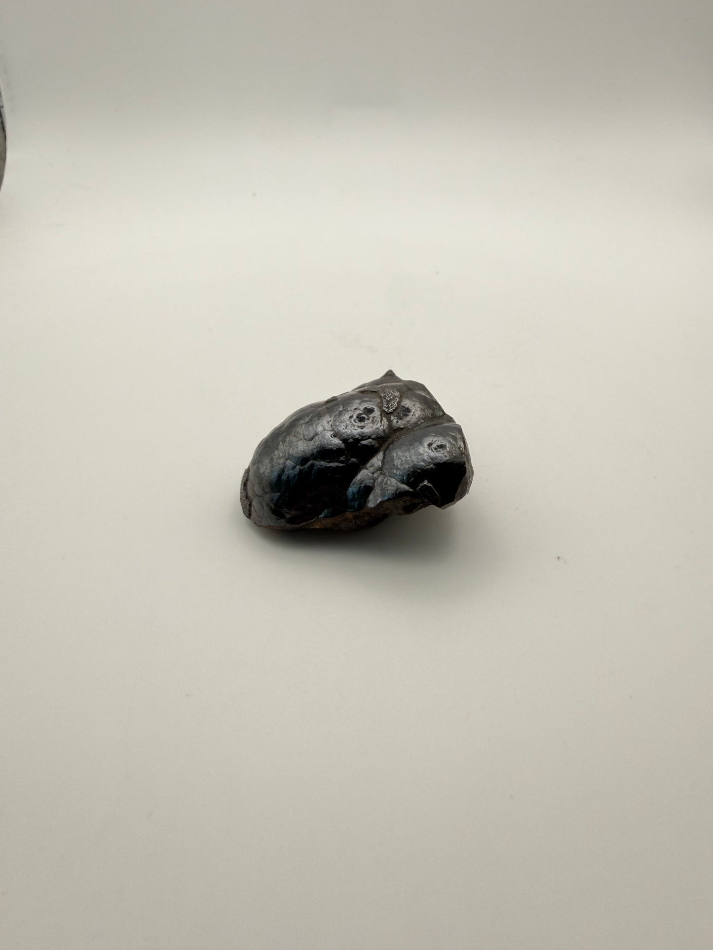 Small raw hematite specimen.