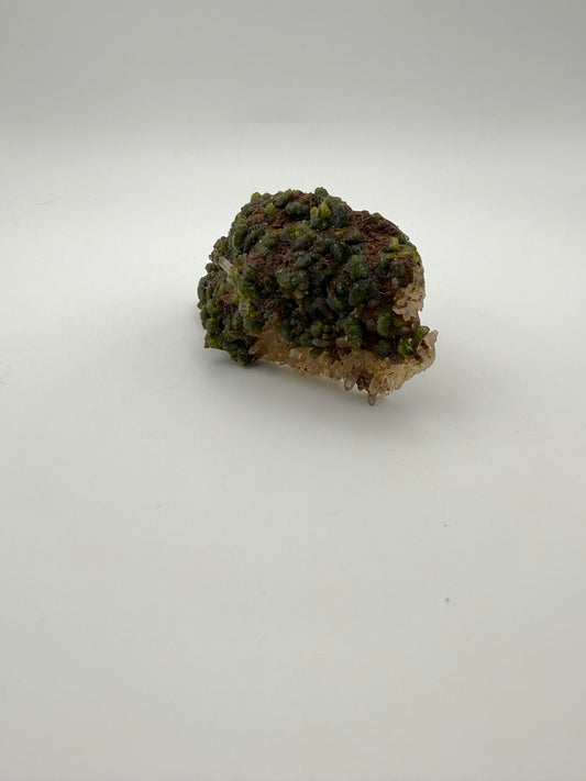 Epidote crystal cluster with good green color.