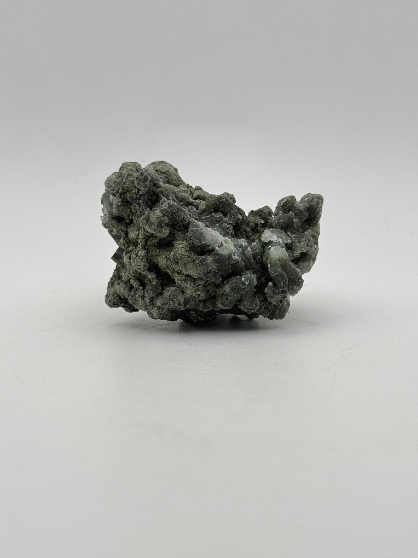 Raw prehnite specimen with amazing green color.