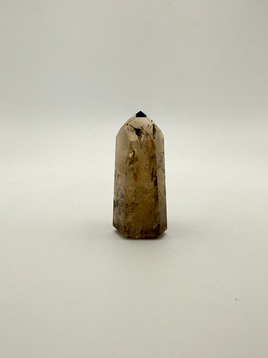 Polished natural citrine point.