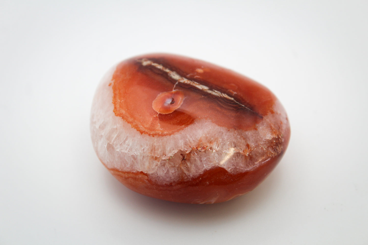 Carnelian crystal palmstone with visible patterns