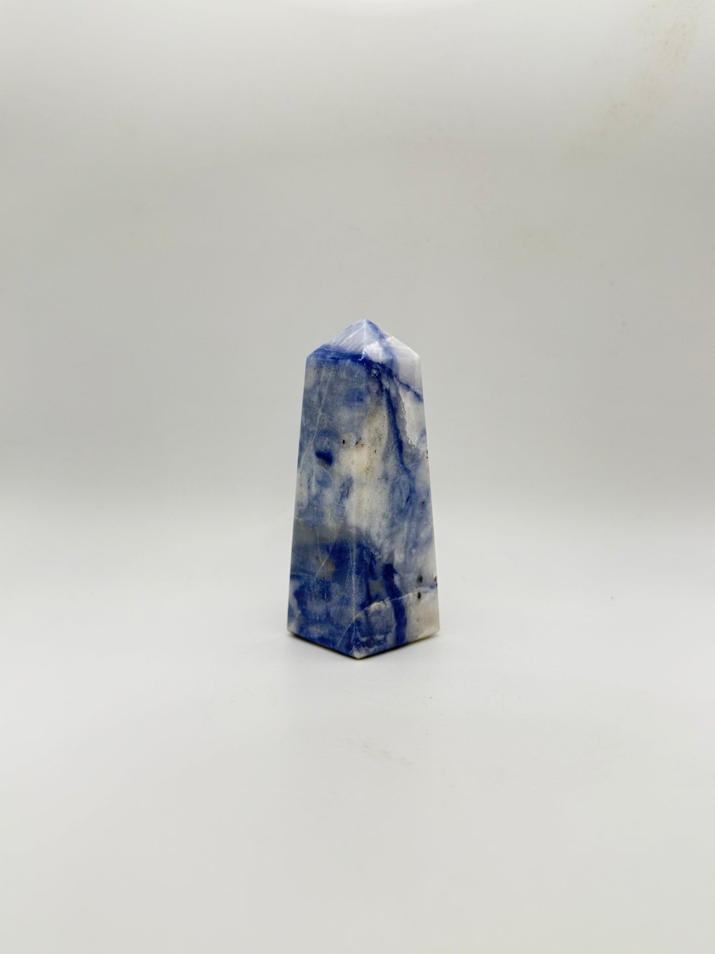 Afghanite four sided tower. Height of 3 1/2 inches, width of 1 1/4 inches.