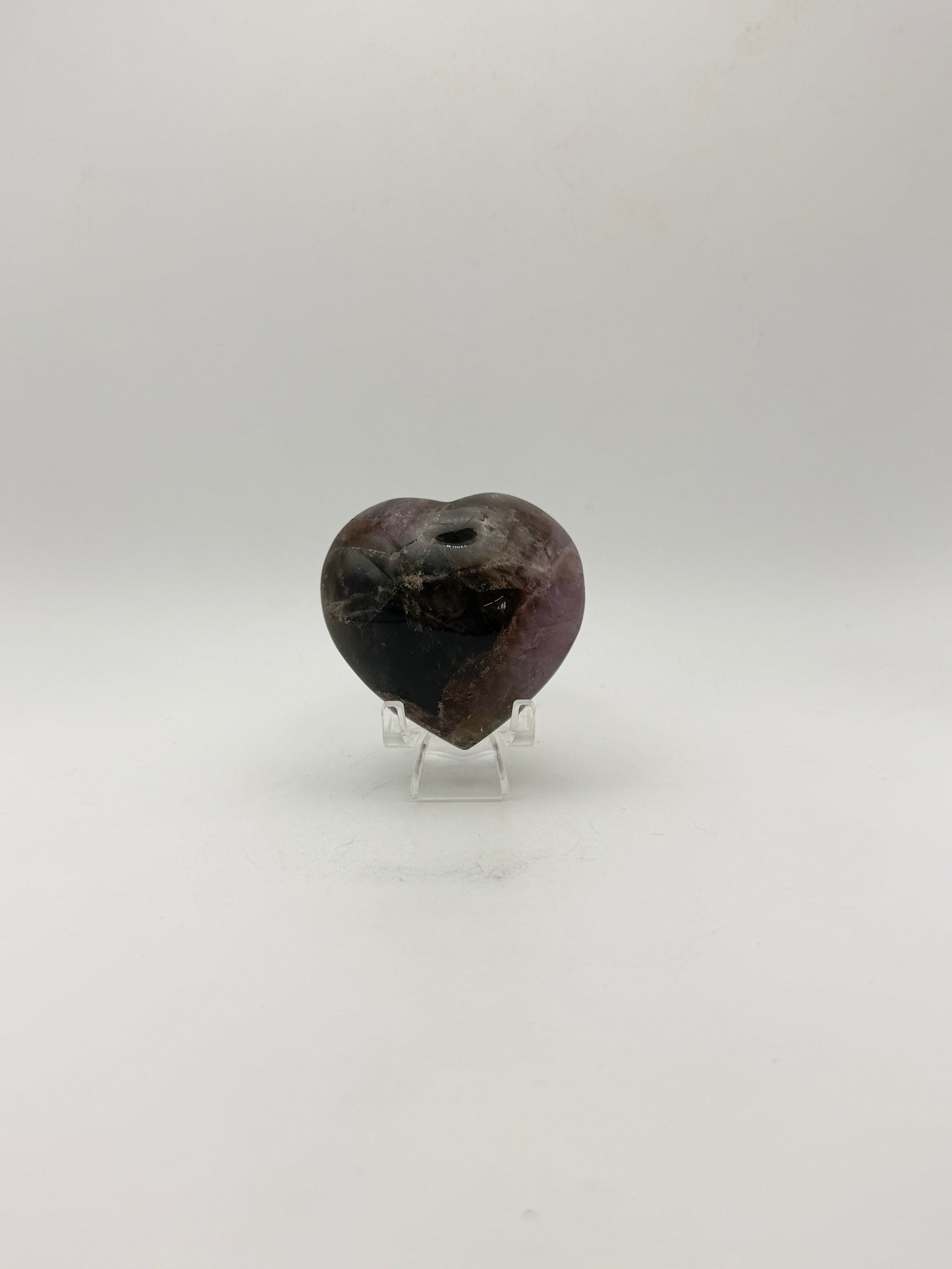 Polished super 7 in the shape of a heart.