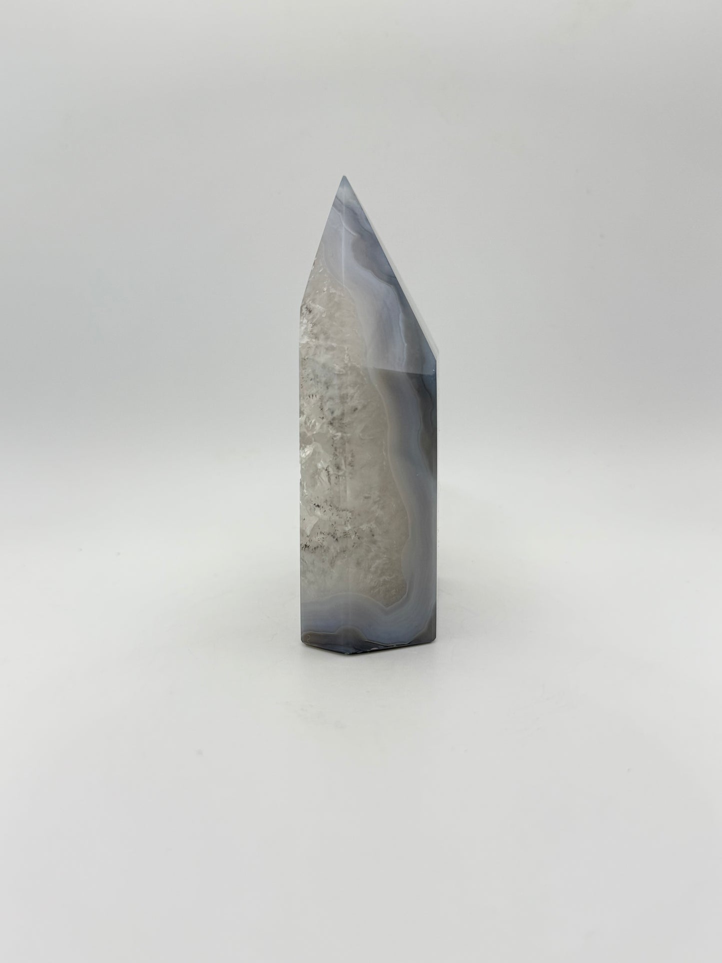 Polished druzy agate tower. a little over 4 inches tall.