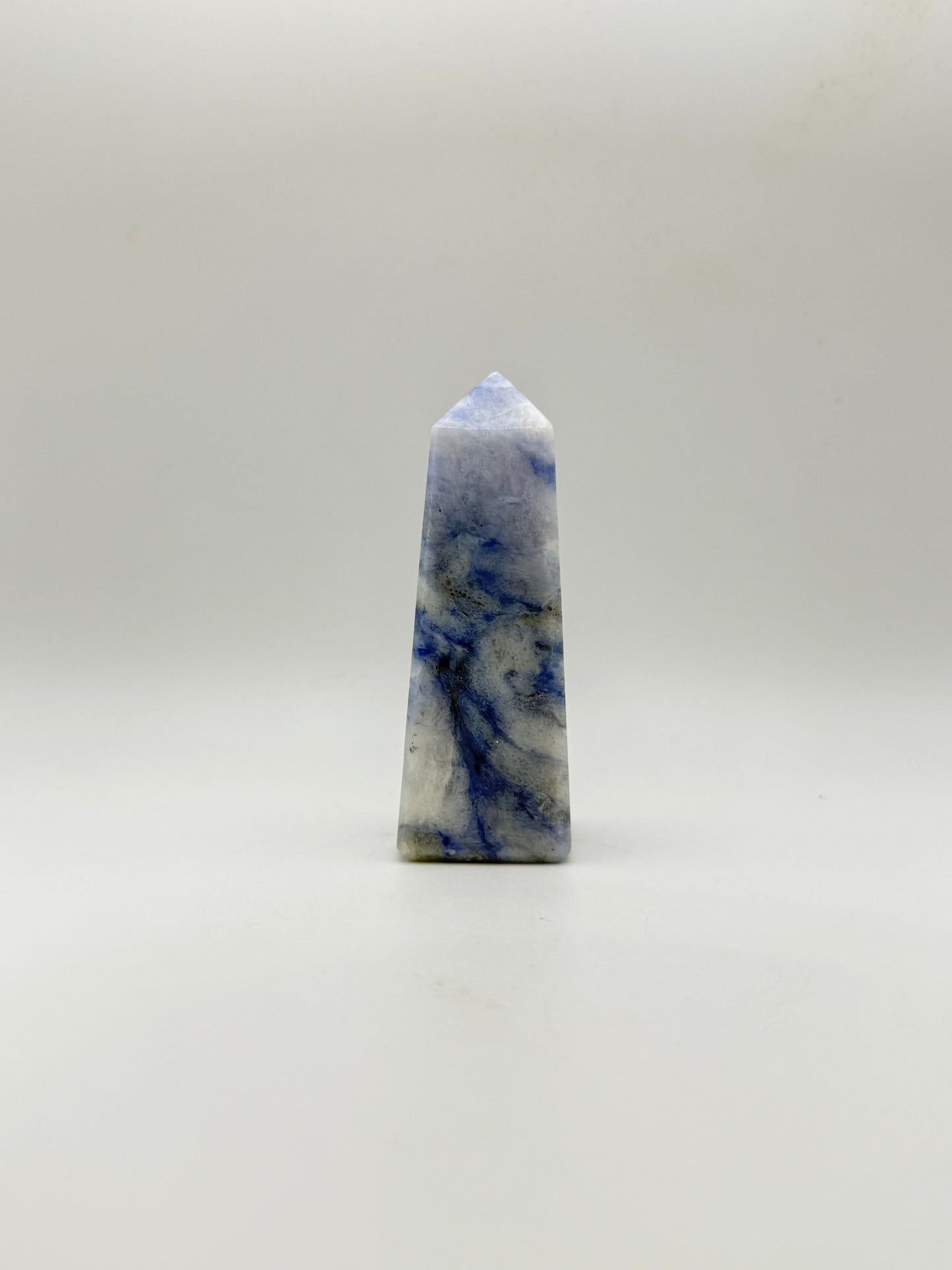 Afghanite four sided tower. Height of 3 1/2 inches, width of 1 1/4 inches.