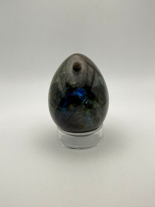 Labradorite polished stone in the shape of an egg.