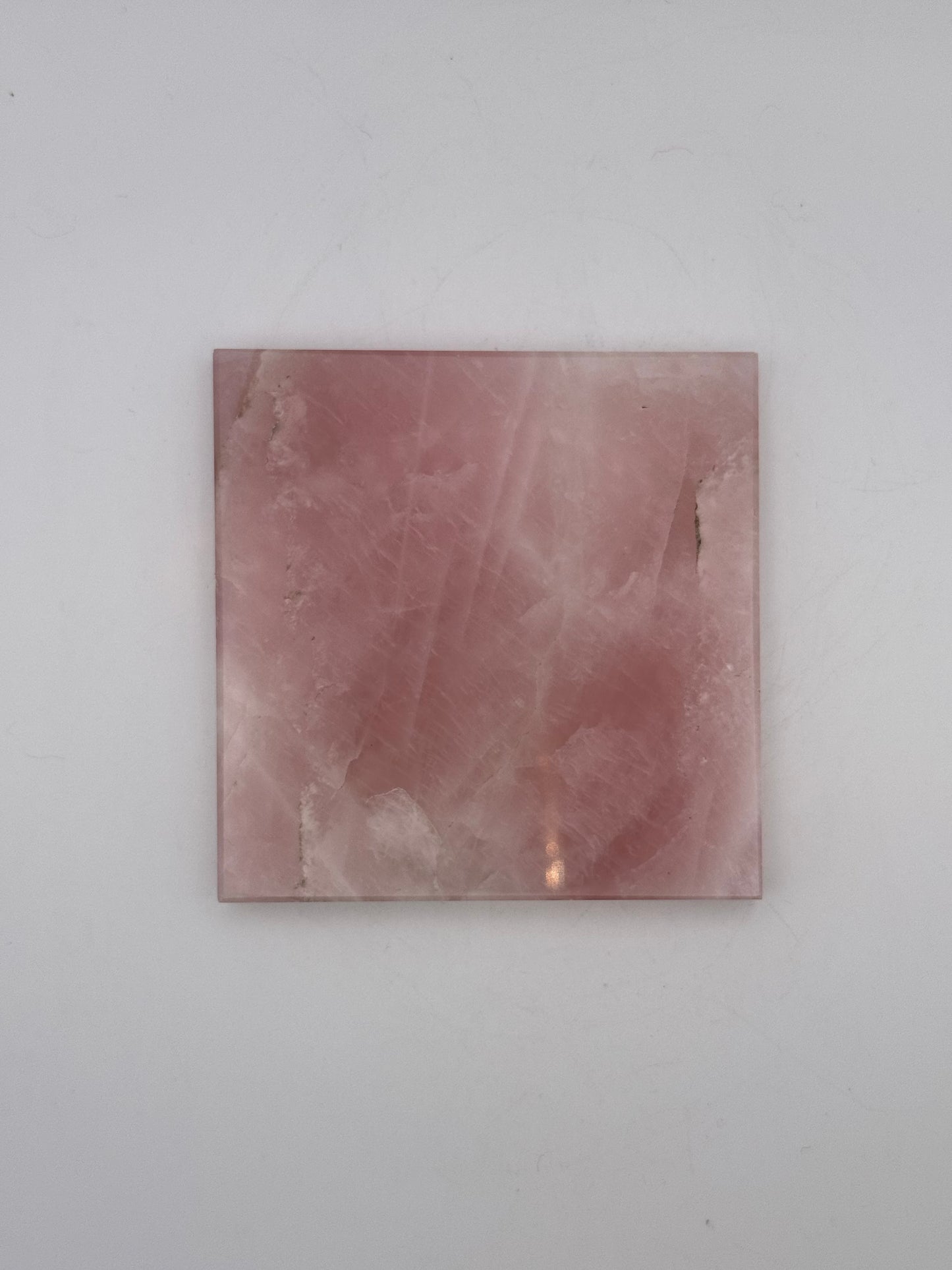 Polished rose quartz tile.