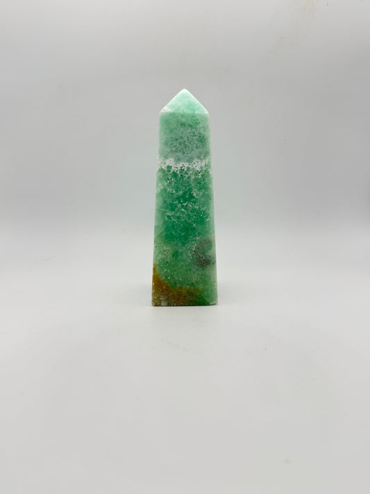 Caribbean Calcite polished four sided tower. This is 4.75 inches tall.