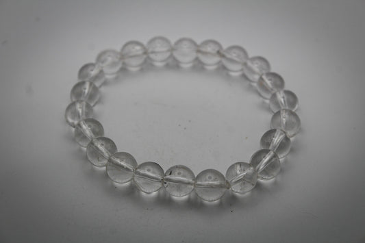 A series of round clear quartz bracelets with 8mm size beads.