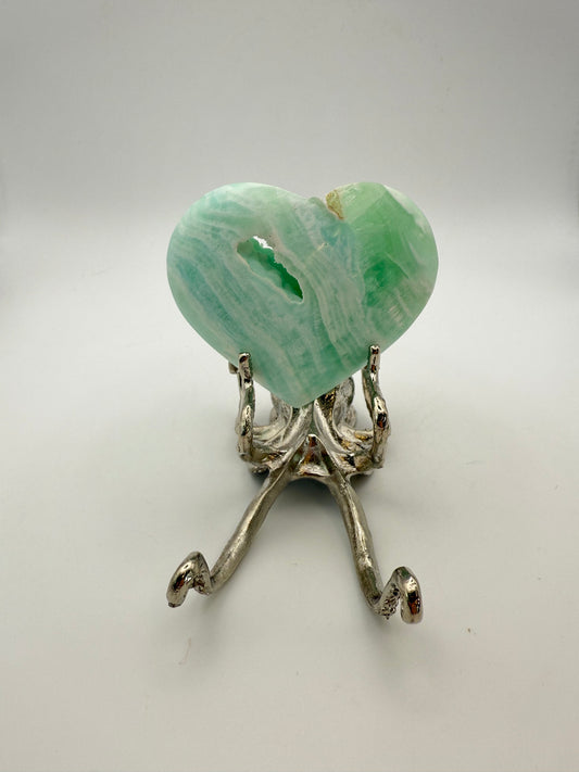 Caribbean Calcite polished crystal in the shape of a heart.