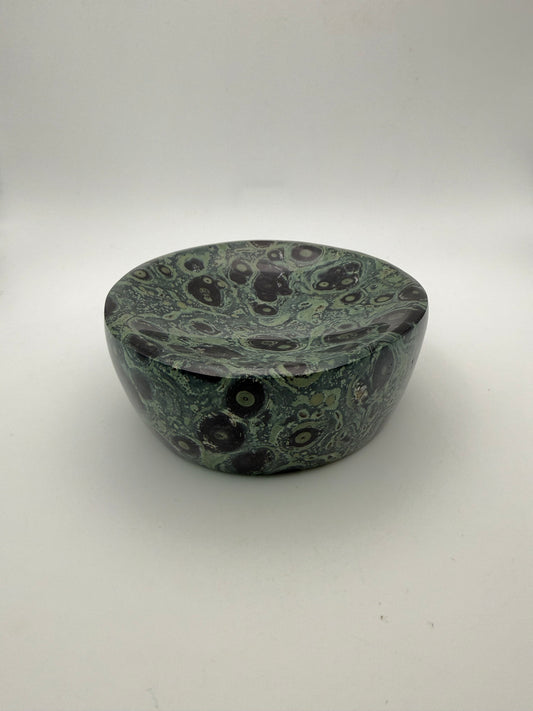Polished kambaba jasper in the shape of a bowl.