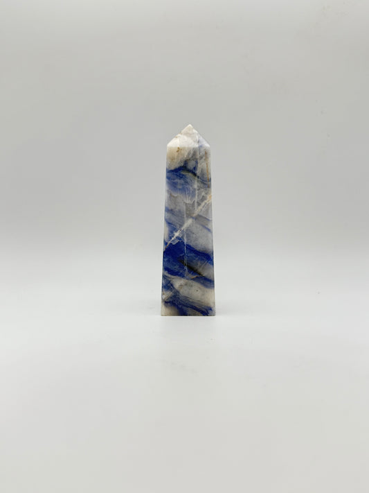 Afghanite four sided tower. Height of 3 5/8 inches, width of 1 1/8 inches.