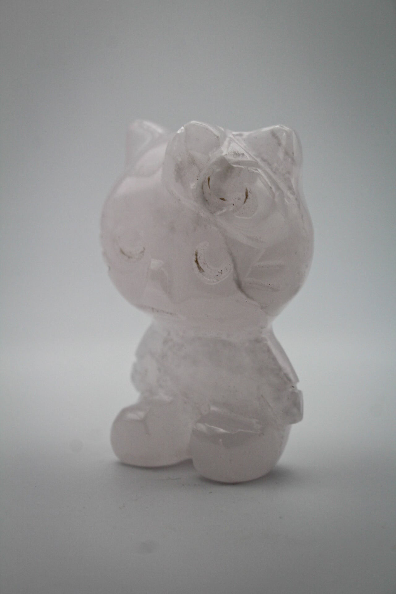 Pink Calcite crystal in the shape of Hello Kitty.