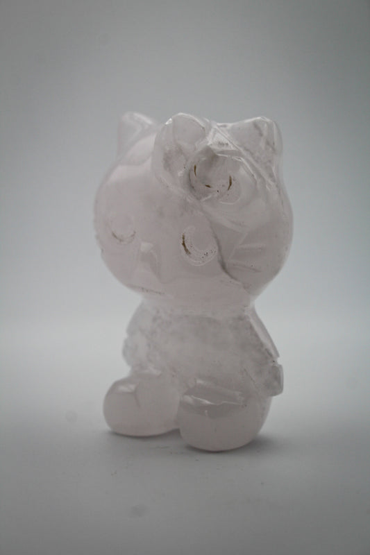 Pink Calcite crystal in the shape of Hello Kitty.