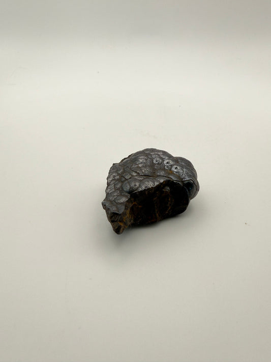 Small raw hematite specimen.