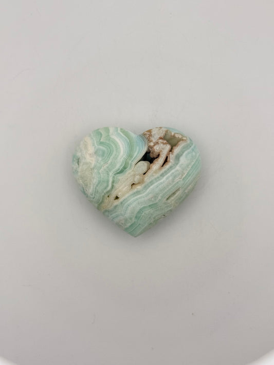Caribbean Calcite polished crystal in the shape of a heart.